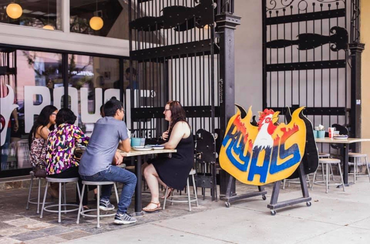 736 E. Market St. 
They technically have two patios. One in the front of the building, and a space with converted shipping containers. Look for the BIG chicken mural. Photo via  Royals Hot Chicken