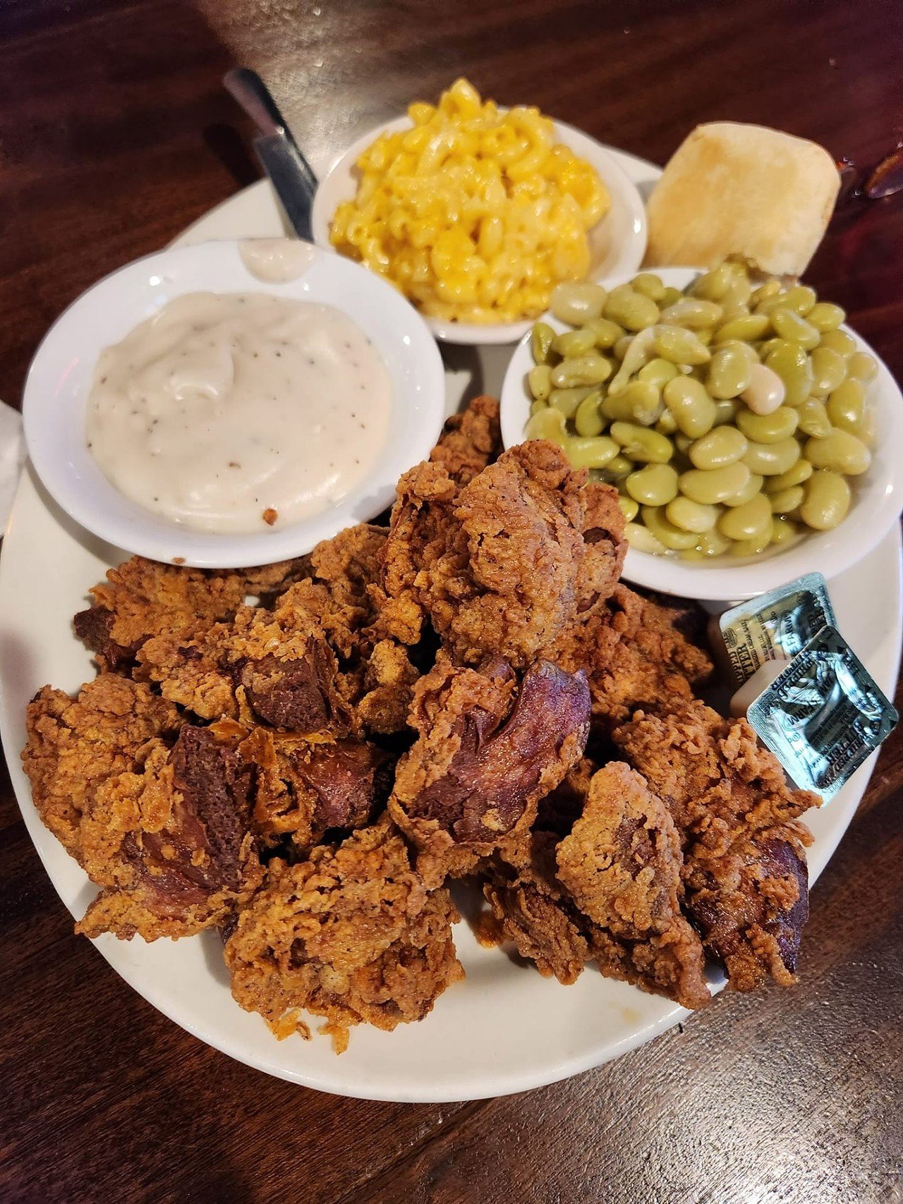 Check&#146;s
1101 East Burnett Ave 
Comfort food galore! Check&#146;s has fried catfish, pork chops, burgers and even has a bar. Photo via  Check&#146;s