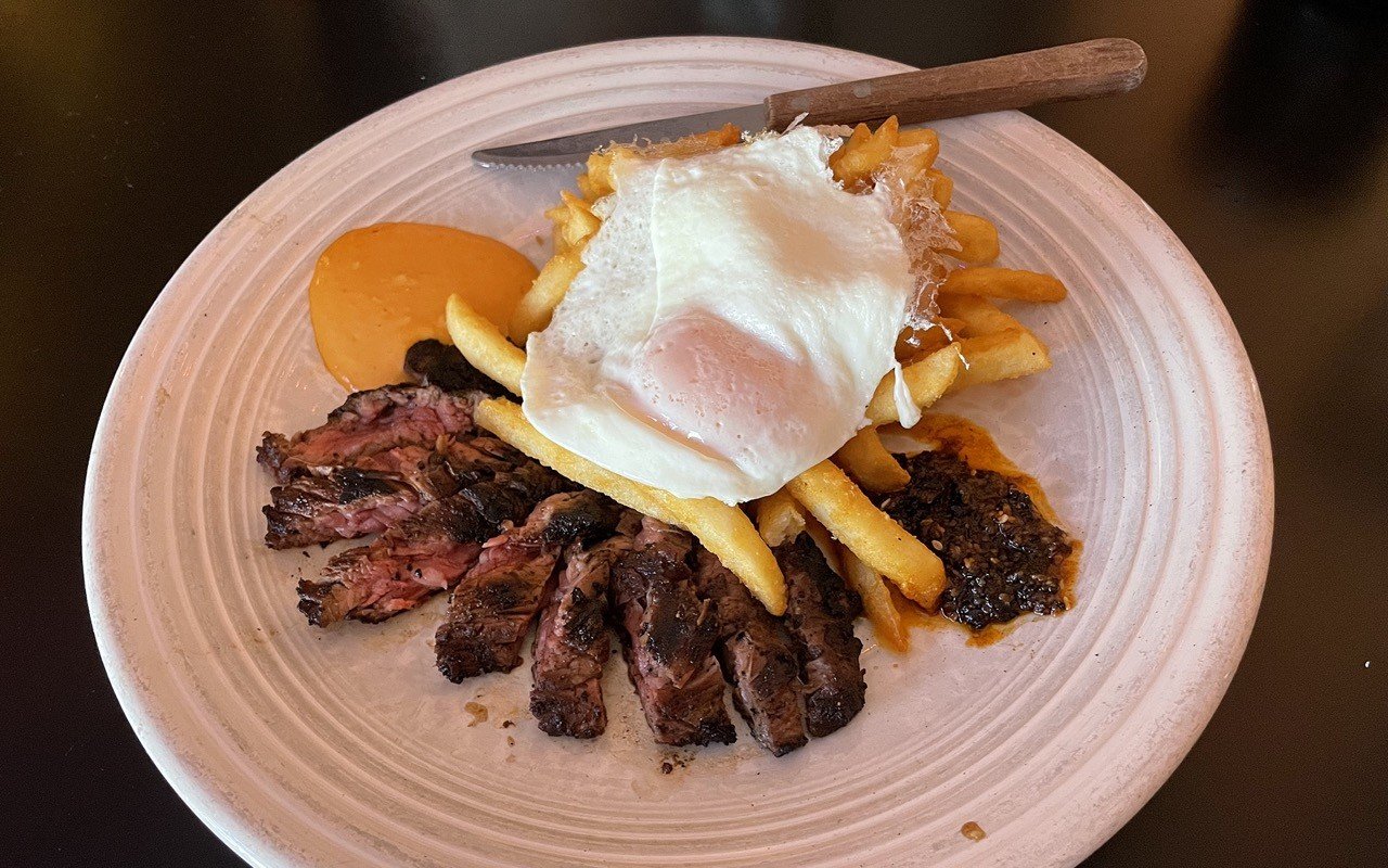 El Mundo's butcher steak gives old-fashioned steak and eggs a warm Mexican flavor that takes them to the next level with a coffee-chile rub, a free-range fried egg, spicy salsas and next-level fries.