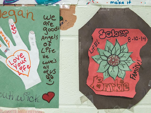 Artwork by former inmates adorn a wall in the women's area at the Louisville Metro Corrections Headquarters