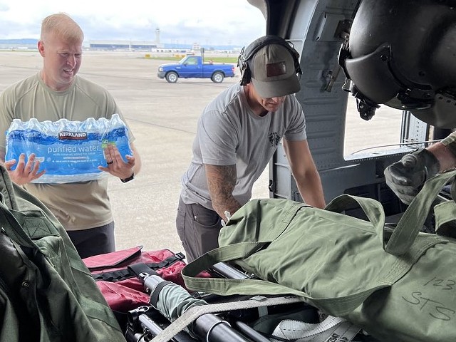 A Kentucky National Guard flight crew with food, water and additional resources for rescue operations.  |  U.S. Army Photo by: Sgt. Jesse Elbouab, 133rd Mobile Public Affairs Detachment.