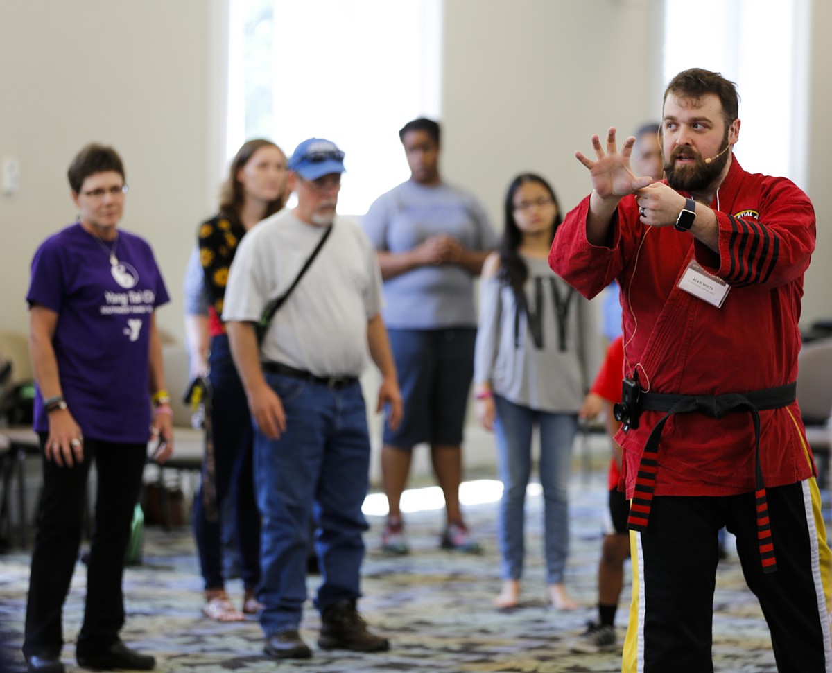 Alan White (right) of St. Matthews Martial Arts demonstrates how to defend against attackers at How-To Festival in 2017.