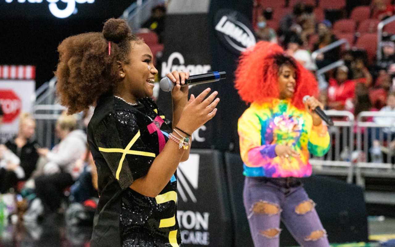 Members of The Real Young Prodigys perform at the halftime of  the Harlem Globetrotters game on January 15, 2022, at the KFC Yum! Center.