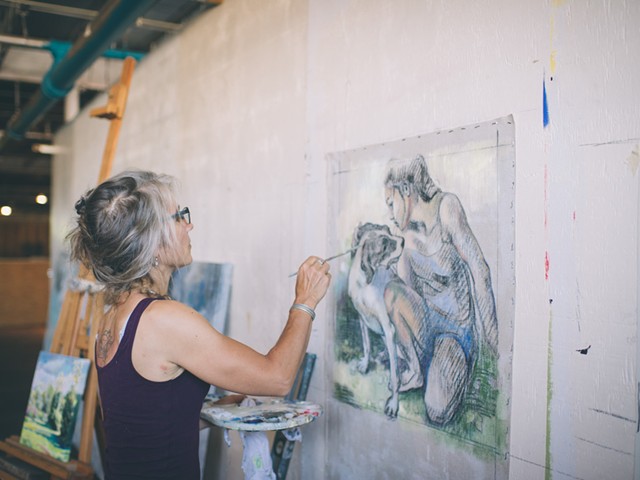 Artist Clare Hirn paints in her studio.  |  Photo courtesy of Louisville Visual Art
