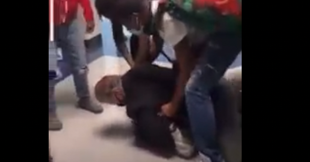 William Bennett pins his student, Jamir Strane, in a video posted to social media.