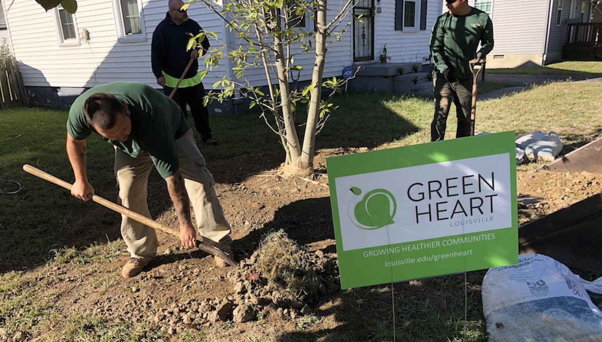 Tree planting during a kickoff event for the Green Heart Louisville project.