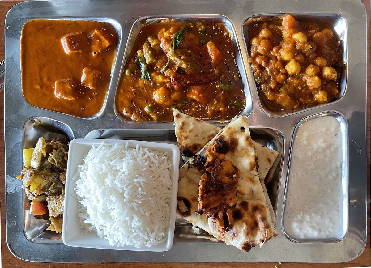 Bombay Grill's thrifty veg platter lunch special offers three curries, app, rice, naan, soup and more.  |  Photos by Robin Garr
