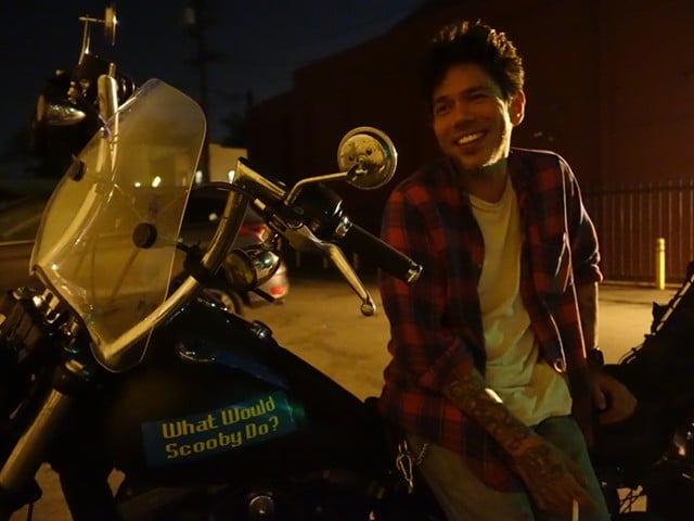 A young Pajo on his motorbike.
