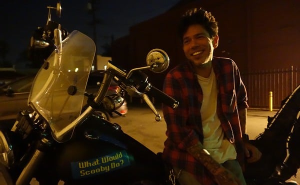 A young Pajo on his motorbike.
