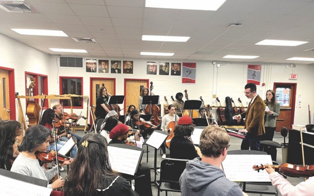 Composer Tanner Porter talking to the the Waggener High School orchestra in March rehearsal.