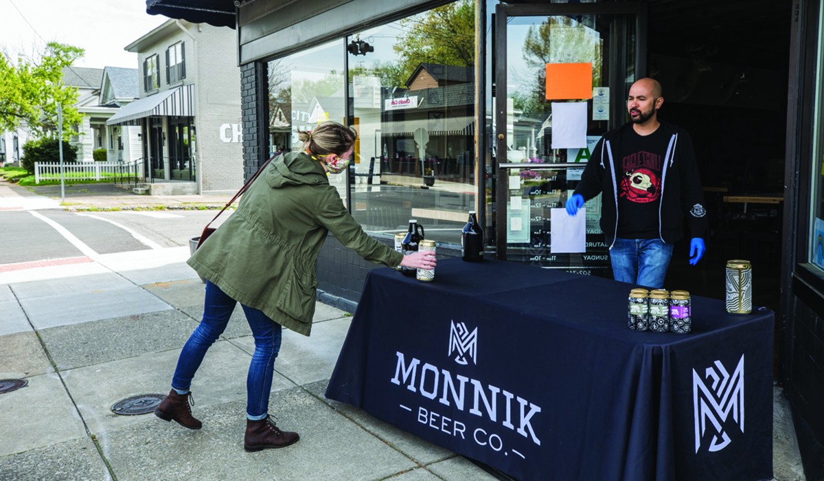 Erin Jackel took her order of 'We Love You,Jen-Nay' to go from Monnik Beer Co.