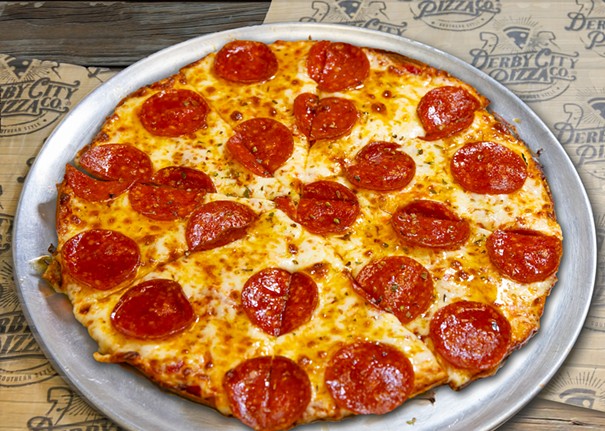  Derby City Pizza Co.
     
    5603 Greenwood Rd.; 10619 W. Manslick Rd.; 2500 Crittenden Dr.; 2331 Brownsboro Rd.; 9910 Linn Station Rd.; 12900 Dixie Hwy.; 587 North Bardstown Road, Mt. Washington; 412 West Daisy Lane, New Albany, IN
    10&#148; Hot Honey Pepperoni Pizza
    This magical spicy sweet pizza starts out on our 10 inch thin and crispy crust, tangy pizza sauce, a generous amount of mozzarella cheese and topped with our premium pepperoni. Then the magic happens with a gorgeous drizzle of the now famous Mike&#146;s Hot and Honey Infused with Chiles that will leave you wanting for more of that lingering flavorful sweet and spicy memory. If you wish for some more heat and for an additional charge you may add our sliced jalape&ntilde;os.