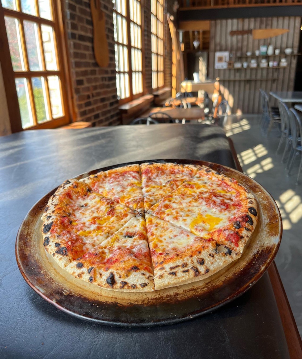  MozzaPi 
12102 La Grange Rd., 1020 E Washington St., 2200 Bardstown Rd.
10? MozzaPi Cheese Pizza 
Louisville&#146;s Best Cheese Pizza &#150; 10? pizza with house made red sauce, east coast blend shredded mozzarella, light cheddar. Barstool Sports rated and approved!