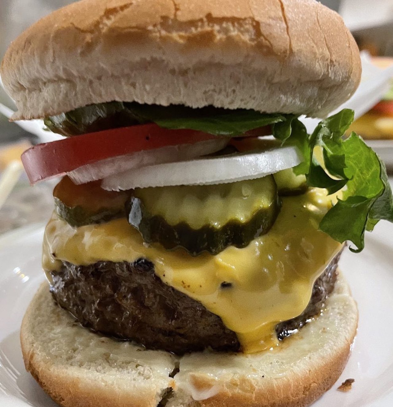 Bambi Bar
Our Signature Burger
Made with a 1/2 lb of fresh hand pattied meat, topped with American cheese, fresh veggies, lettuce, tomato, onion, pickles, and mayo.
