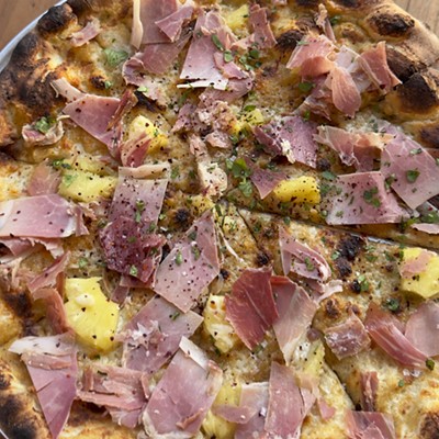 The Pika: Broadbent Kentucky ham, garlic confit, jalapeño-pickled pineapple, mozzarella, cilantro garnish, chili flake