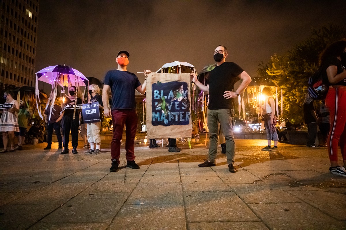Protesters gathered in Jefferson Square Park on Tuesday night to 
    fight for climate justice and Black lives.