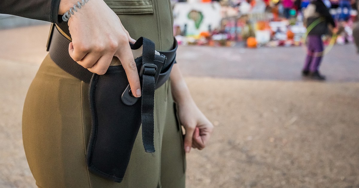 Protesters in arms: Guns as plentiful at protests as the reasons people carry them