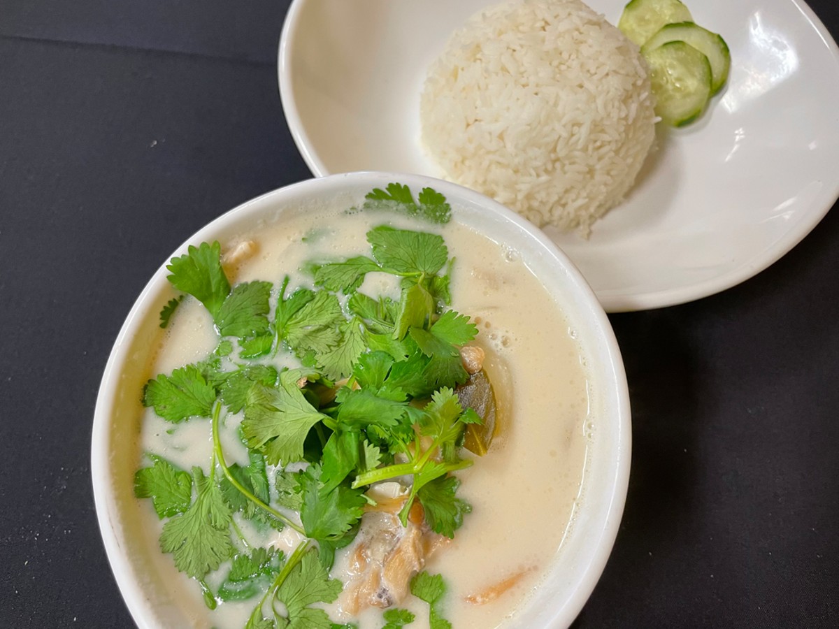 The subtle aromatics of chicken broth and coconut milk, lemongrass, and cilantro elevate the flavor of tom kha gai (Thai hot and sour chicken soup).