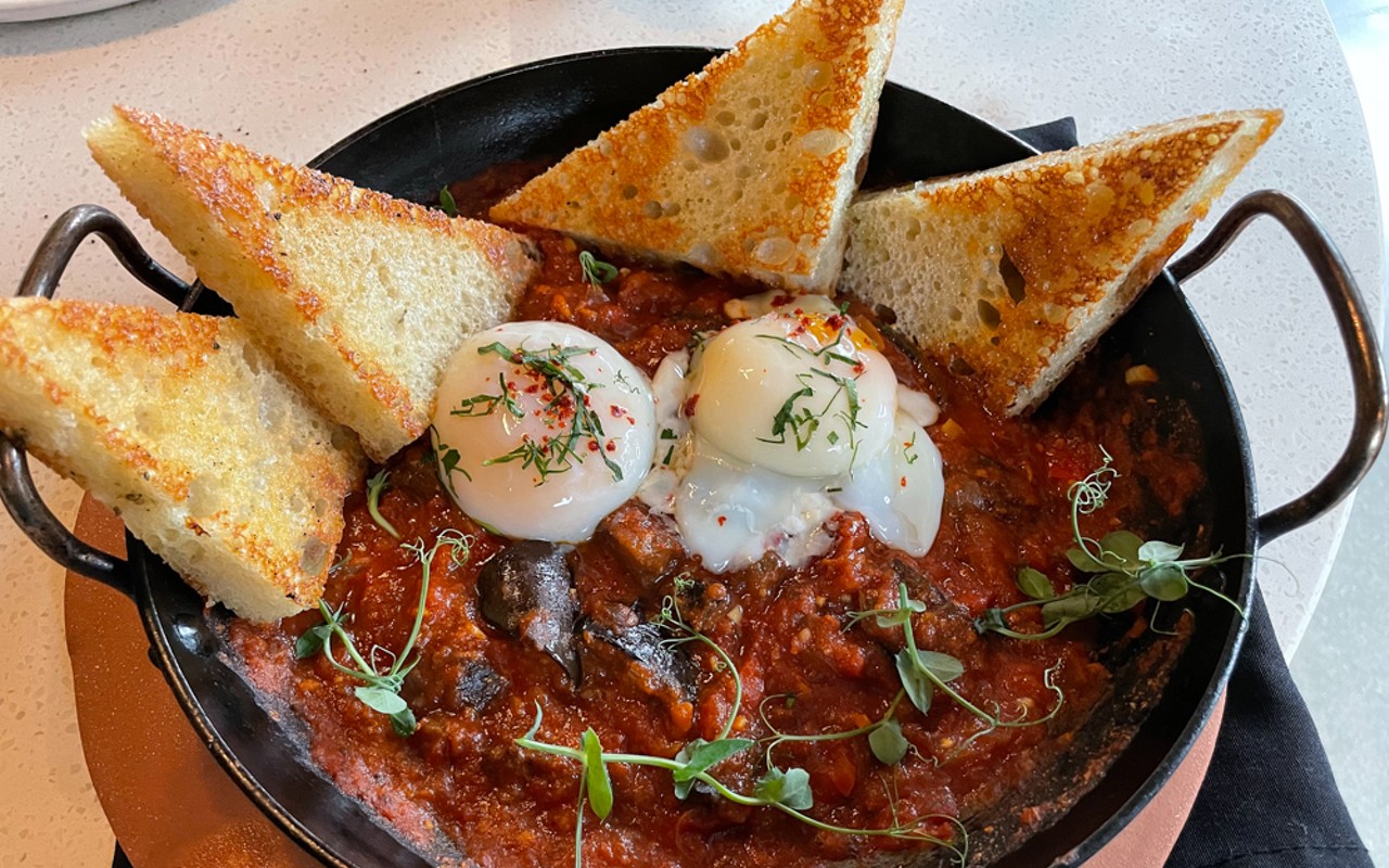 Popular throughout the eastern Mediterranean, shakshuka pops poached eggs atop a bed of spicy, coarsely textured tomato stew.