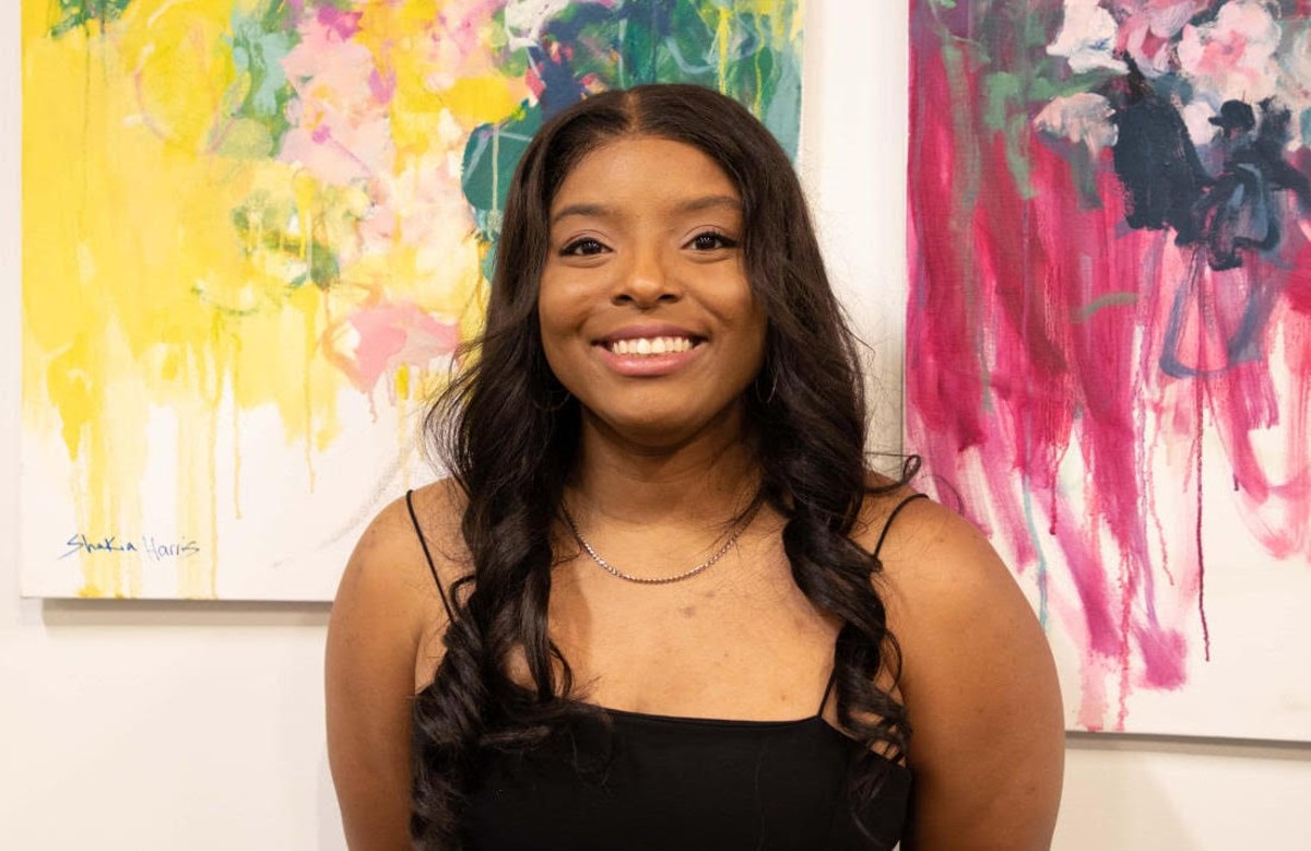 Local artist Shakia Harris is building her own table with her first self-executed solo art exhibition, "Feel My Words."