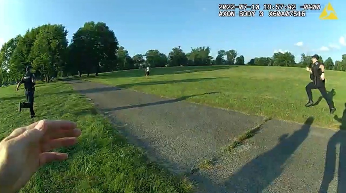 A screenshot from bodycam footage shows LMPD officers chasing Herbert Lee in Shawnee Park on July 10.  |  Photo via LMPD.