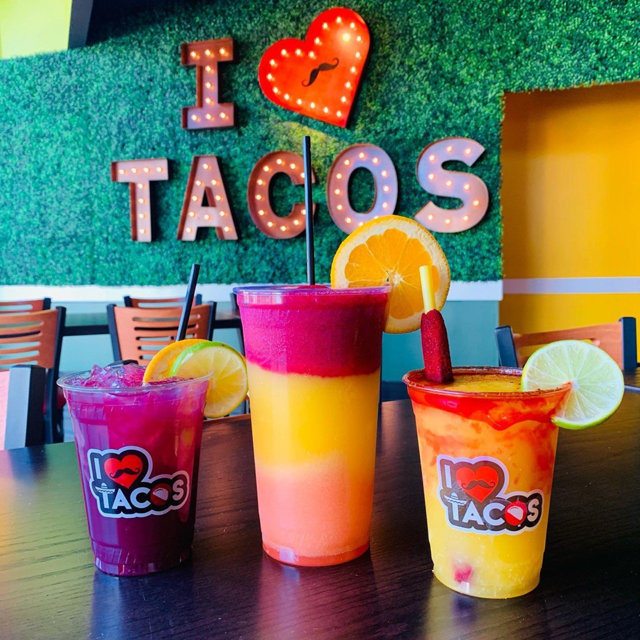  I Love Tacos 
9099 Taylorsville Road, 1534 Bardstown Road, 3550 Springhurst Commons Drive 
This local chain is a hit for its food (we particularly recommend the quesadilla birria), but the bright colors and lit-up greenery wall at each location also lend themselves to cute Instagram shots.
Photo via ilovetacoslouisville/Instagram