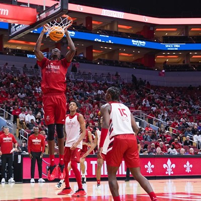 Dennis Evans dunks the ball during the Red and White Scrimmage at the KFC Yum! Center on October 11, 2023.