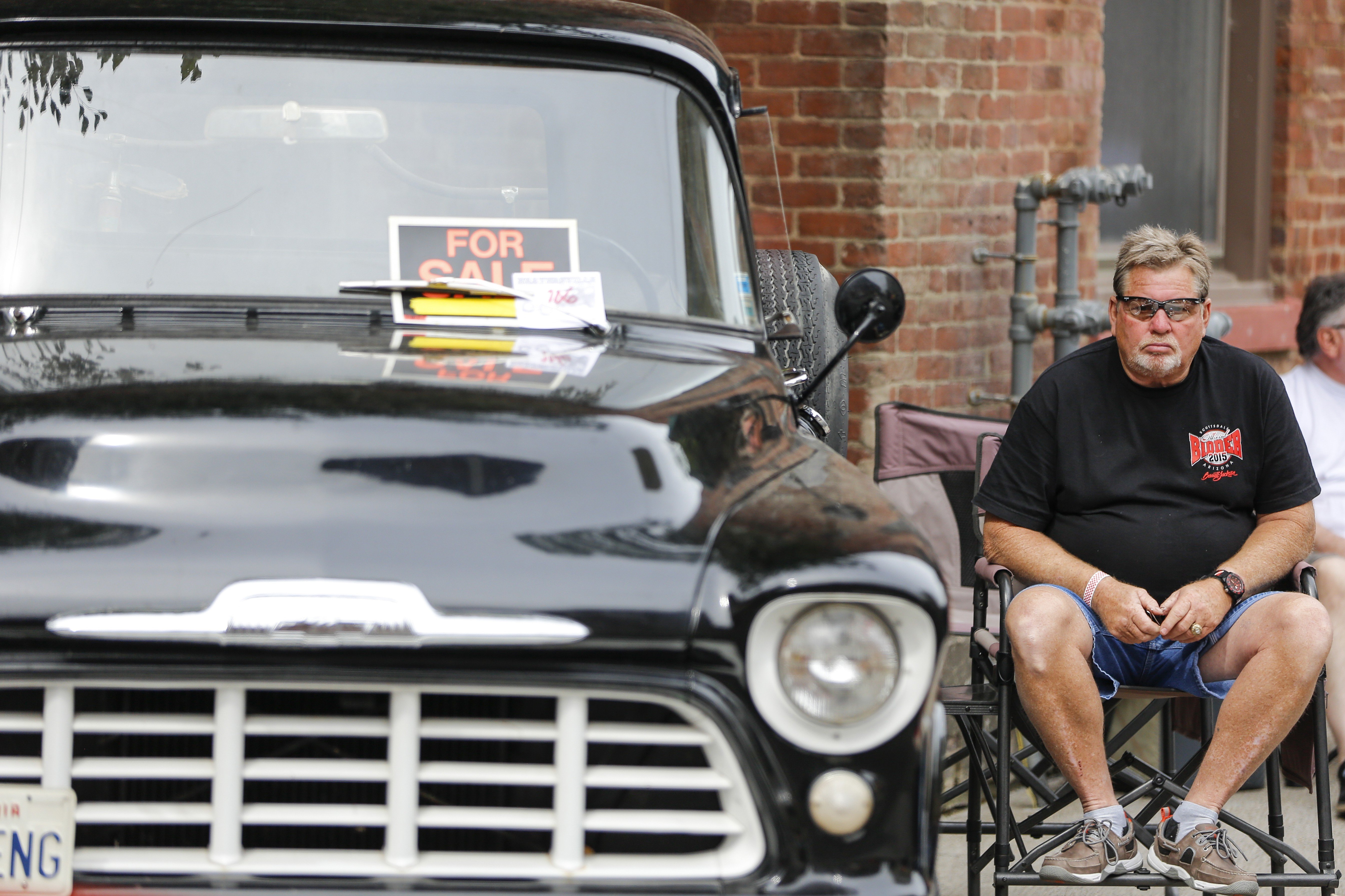 Kenny Hoerter Sr. sits by his car at the Beatersville Car and Bike show. Hoerter owns a shop in Butchertown where he keeps his pristine hotrods and memorabilia from as early as the 1940&#146;s. &#147;I just like lookin&#146; in the past I guess.&#148;