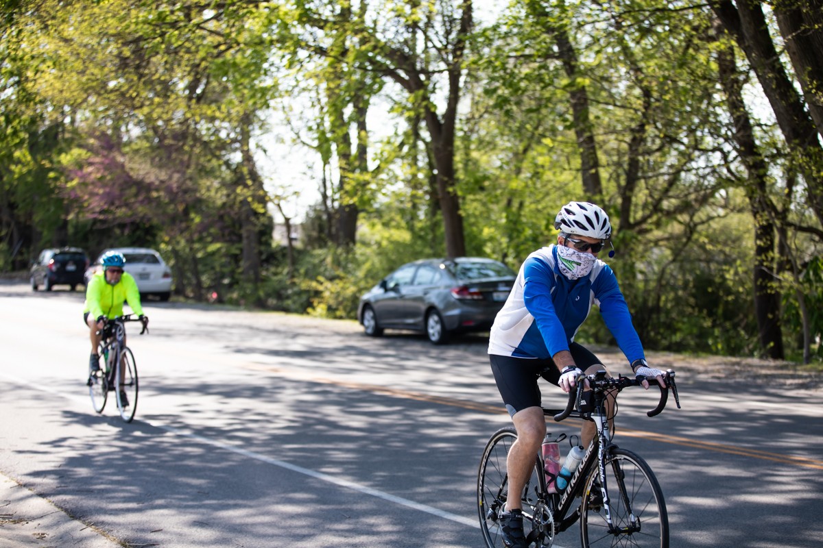 Cyclists ride around the loop in Seneca Park. - KATHRYN HARRINGTON