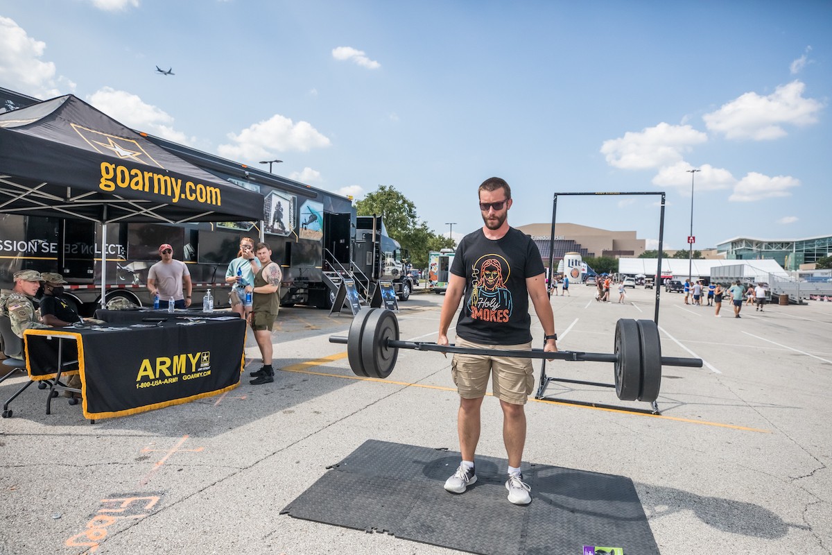 Marshall Ferguson lifted 240-pounds at the ARMY recruiting tent.