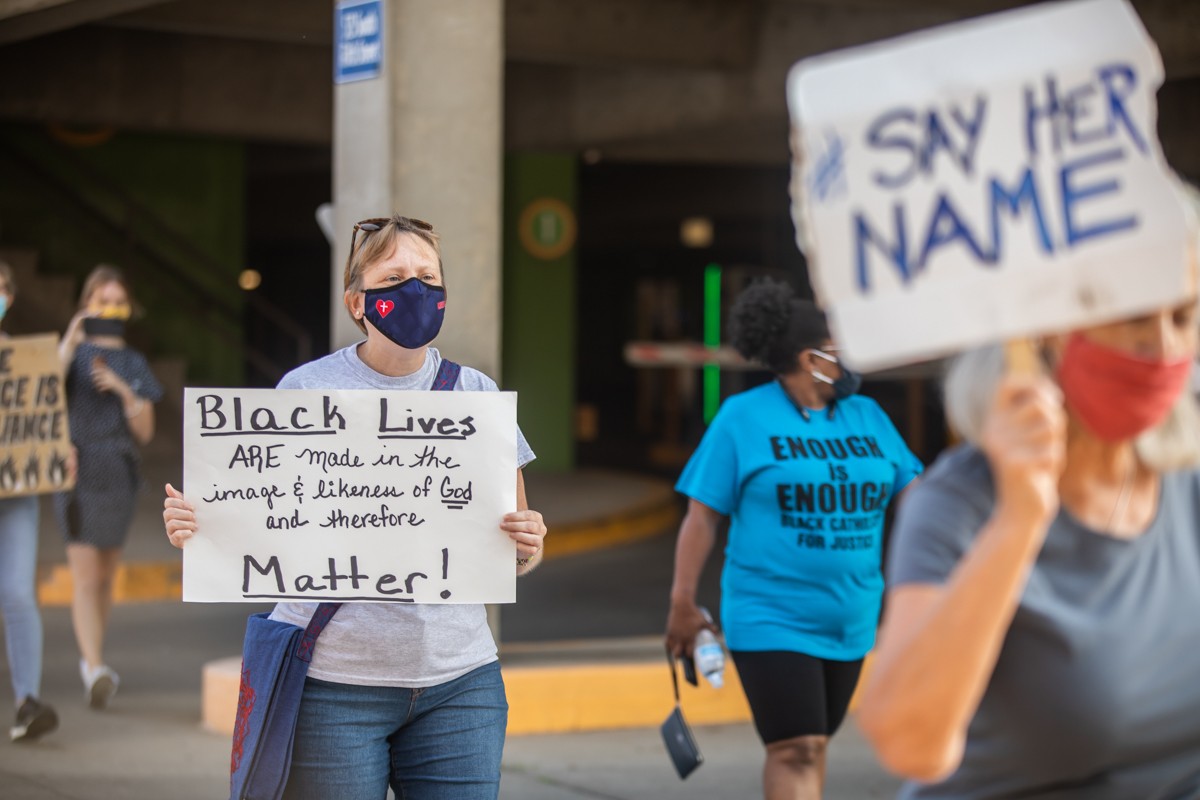 Members of the Louisville Catholic community came out to march for Black lives on Saturday from the Cathedral of the Assumption to the Gene Snyder Federal building. - KATHRYN HARRINGTON