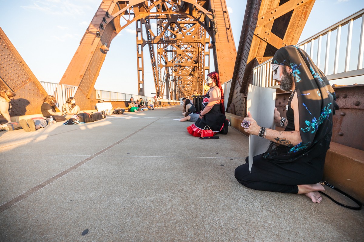 The Derby City Sisters held a vigil on the Big Four Bridge on June 13 to support racial justice and Black rights. - KATHRYN HARRINGTON