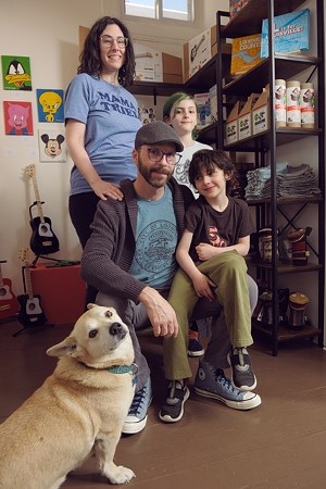 The Gradys, Jane and Jae with sons Arlo and Ronan, and now shop dog Lobo.