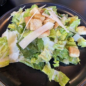An estimable caesar salad was carefully made, crisp and fresh, and a single serving was plenty for two to share.