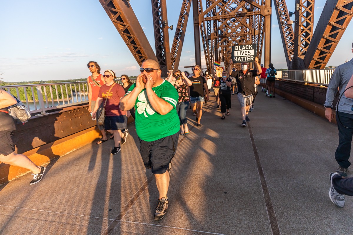 Tom Murphy was at the head of the peaceful march on the Big Four Bridge as protesters chanted the names of Breonna Taylor and George Floyd. - KATHRYN HARRINGTON