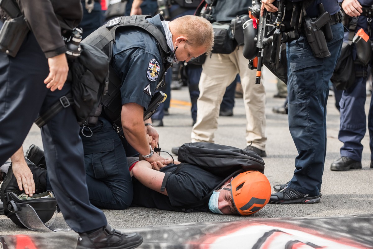 A protester is arrested on Bardstown Road. - KATHRYN HARRINGTON