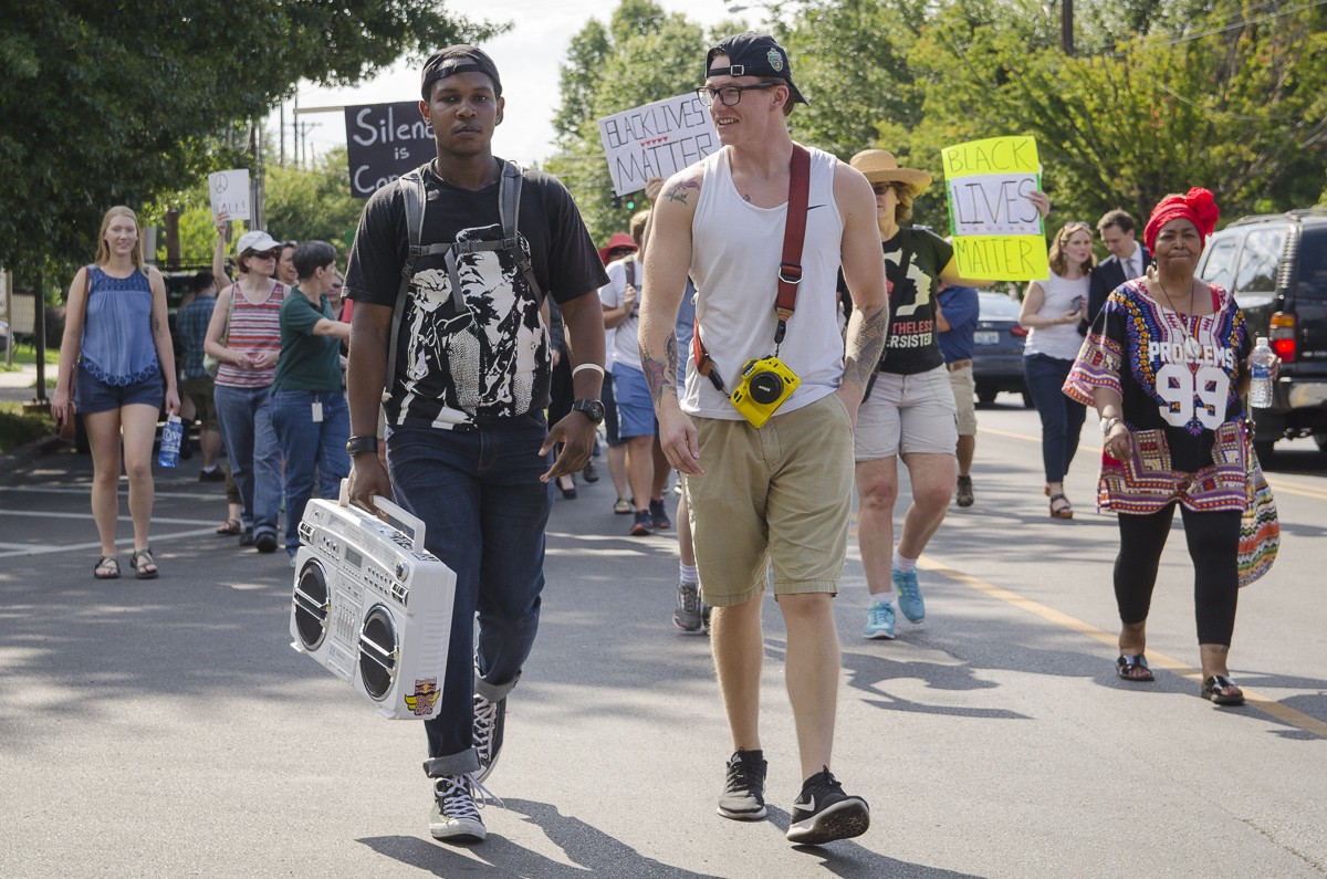A boombox playing protest music as the rally marched down Broadway. - Nik Vechery
