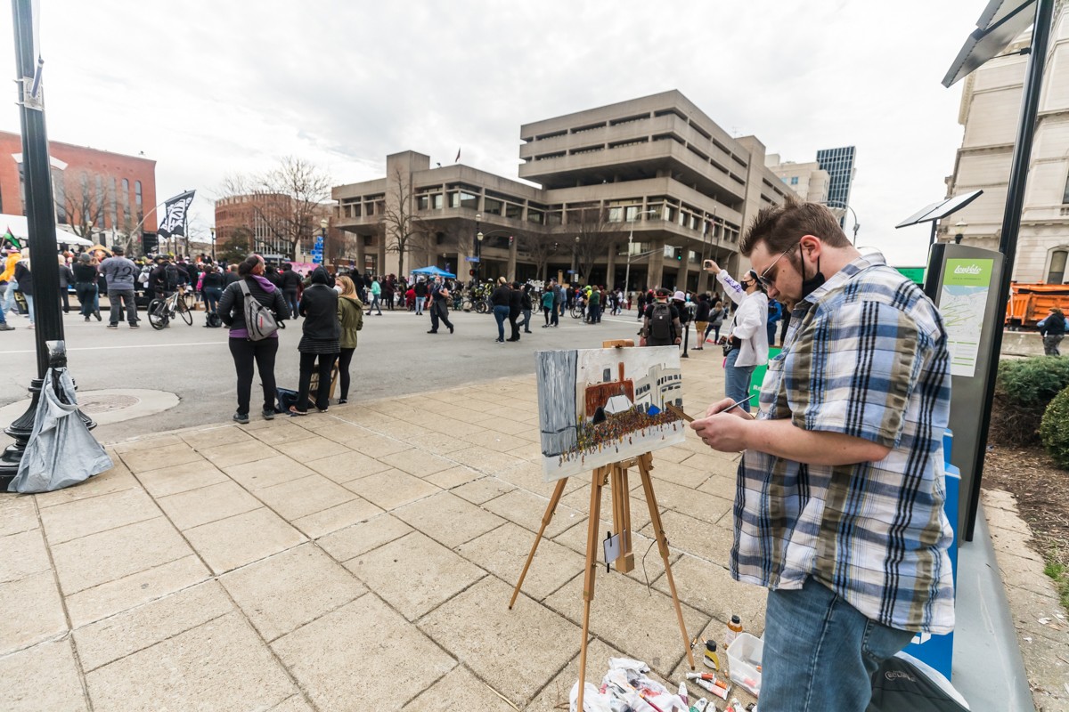 Charles Meredith painted the scene at Jefferson Square on Saturday. - KATHRYN HARRINGTON