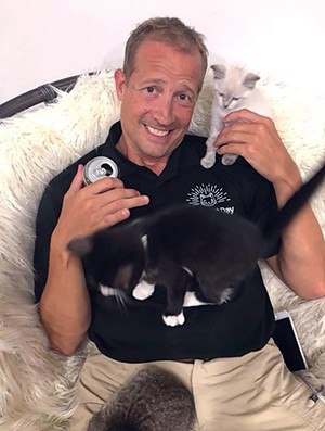Chuck Patton, &#145;purrprietor&#146; at the Purrfect Day Cat Caf&eacute;.