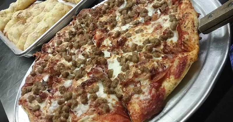 Loaded with sausage, a pizza straight from the oven at Danny Mac's Pizza in the Mellwood Art Center. |  Photo courtesy of Danny Mac's