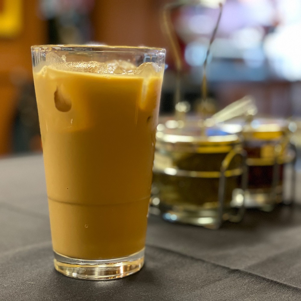 Almost sweet enough for dessert but plenty tasty as an antidote to fiery Thai fare, strong Thai coffee is enriched with a generous portion of sweet condensed milk.
