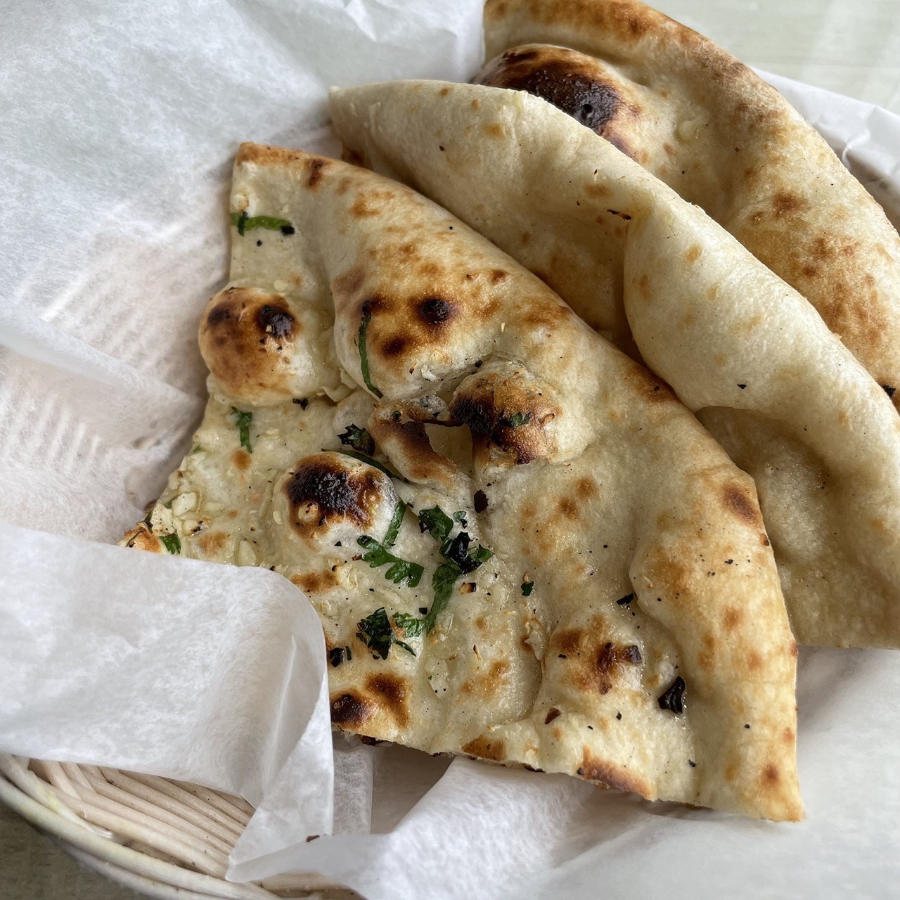 Garlic naan at Sankalp is exceptionally well made, chewy yet light, loaded with garlic and baked in the tandoor.