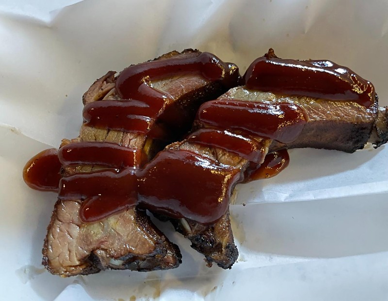 Hot off the smoker, dry-rubbed and cooked to perfection, juicy and firm but not falling off the bone (in other words, overcooked), Four Pegs' smoked baby back ribs are as good as it gets.