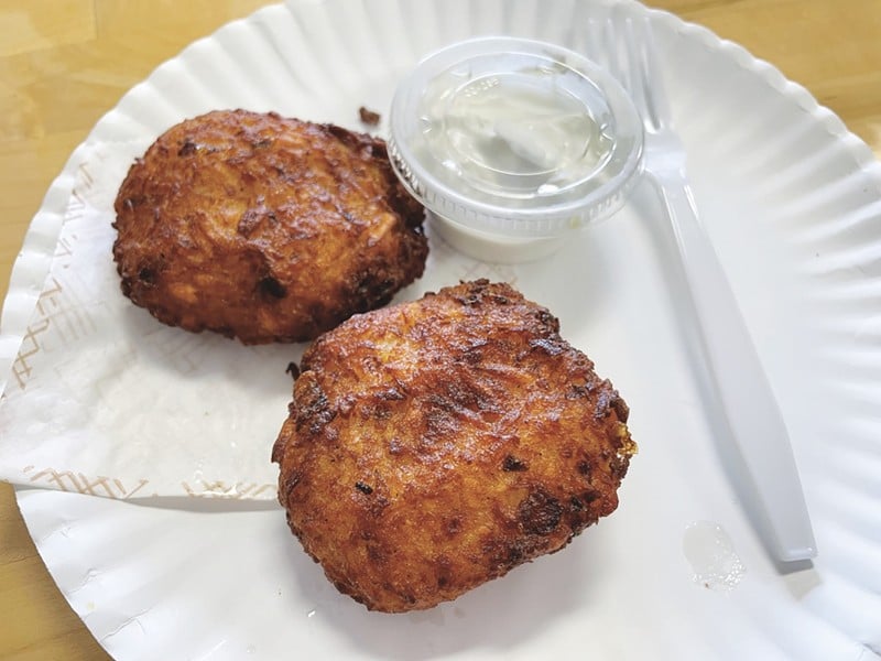 Call them potato pancakes or call them latkes. Either way you'll get a golden brown and delicious ball of steaming fried goodness, with your choice of sour cream or applesauce on the side.