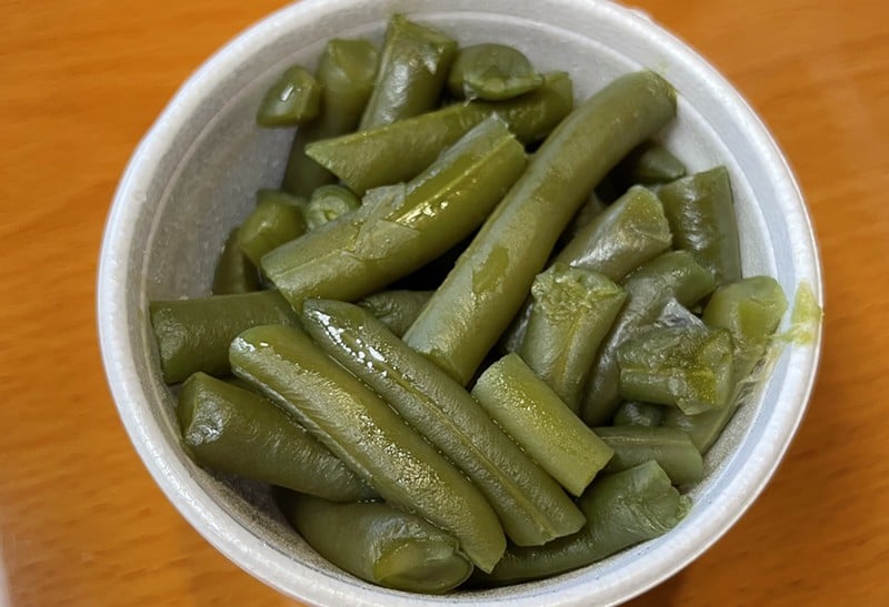 A side dish of green beans in classic simplicity, long-simmered and fresh tasting, without additional seasoning or flavors. - Robin Garr