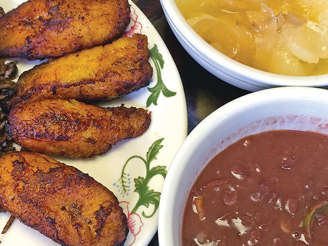 Yoli's Cafeteria Cuban Restaurant's maduros with black bean rice, fried plantains, yuca and red beans