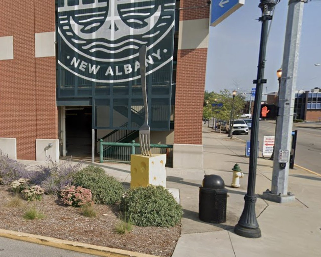 Fork in the Road
West Market Street, New Albany, Indiana
This Fork in the Road statue, created by artist David Thrasher, used to literally be stuck in a median in the middle of Market Street in New Albany. During a redesign of the street, it was moved to the sidewalk, where it&#146;s even more delightfully nonsensical. 
Photo via Google Street View