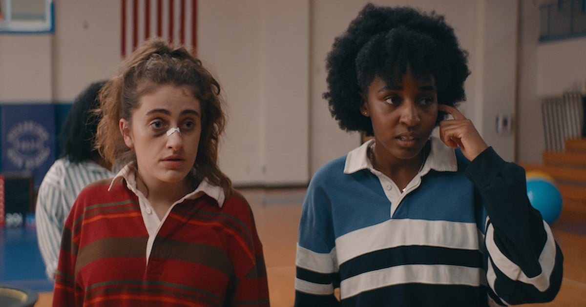 Josie (Ayo Edebiri) and PJ (Rachel Sennott), on the far left, cope with the absurdity of high school.